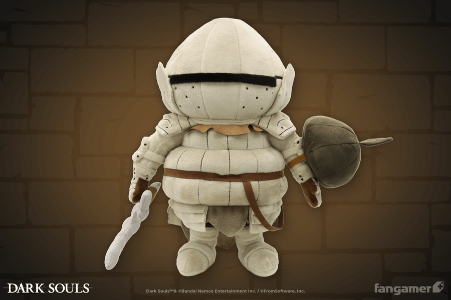 The official Siegmeyer plush glowing subtly against an illustrated brick background, showing its magnetically attached plush sword and elastic-banded plush shield accessories. - Siegmeyer Plush - DARK SOULS